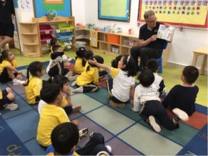 Nick Botting reading to Pre-K students