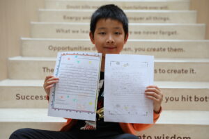 Student with Pen Pal letter