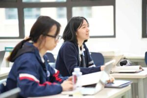 Students engaging in discussion about language interview